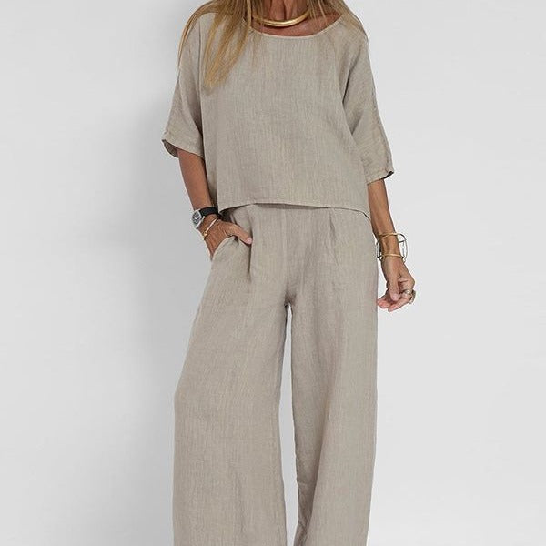 Stijlvolle gele dames tweedelige set met oversized korte mouw top en wijde broek, perfect voor een relaxte lente outfit.