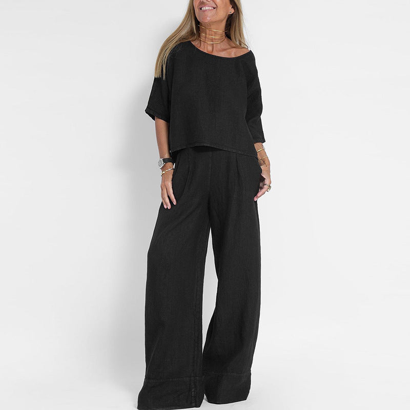 Witte casual dames co-ord set: oversized korte mouw top en wijde broek, perfect voor een comfortabele en luchtige lente.