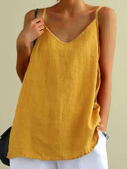 Elegante dames zomertop met oversized pasvorm, V-hals en verstelbare spaghettibandjes; perfect casual.
