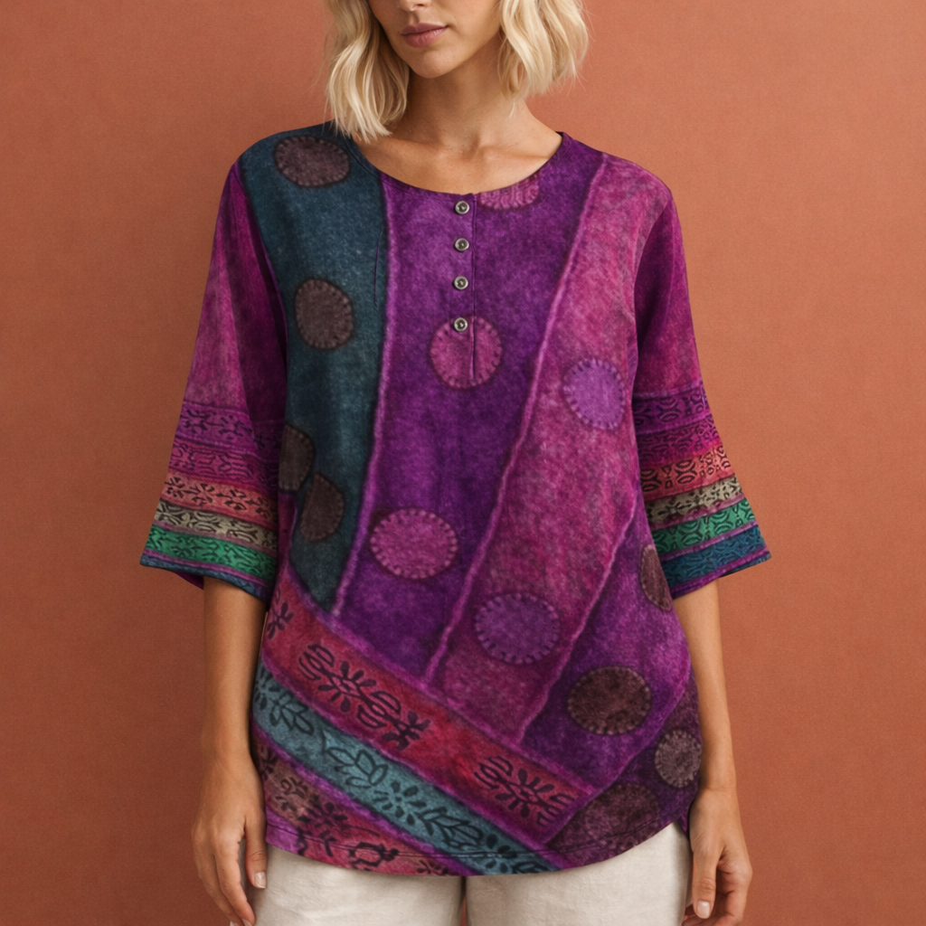 Comfortabele, casual dames oversized topje met opvallende kleurrijke print. Geschikt voor lente & zomer.