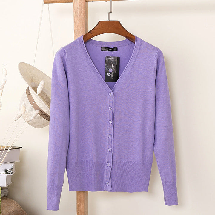 Dames cardigan met lange mouwen in pastel, V-hals en knoopsluiting. Stijlvol en veelzijdig.