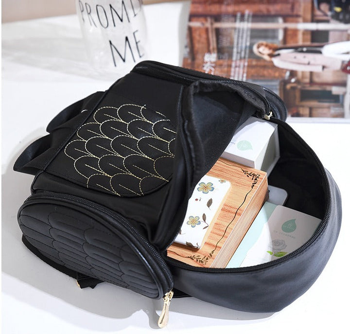 Compacte PU leren uilenrugzak, perfect als reistas of dagelijkse tas voor dames.