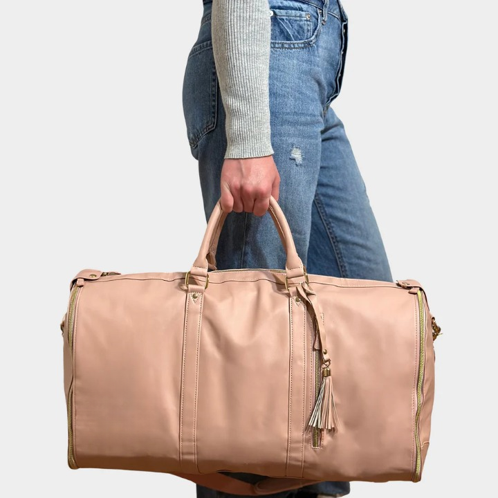 Stijlvolle duffel bag dames met apart kledingvak, voorkomt kreuken. Handbagage formaat voor zorgeloos reizen.