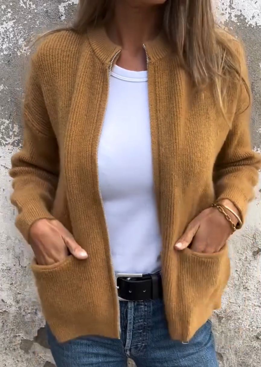 Modern dames ritsvest, een must-have voor casual en elegante dameskleding. Veelzijdig te dragen.