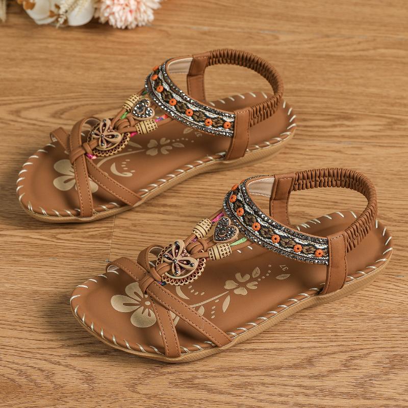 Stijlvolle vrouwen sandalen met platte zool en comfortabele elastische band, perfect voor lange zomerdagen.