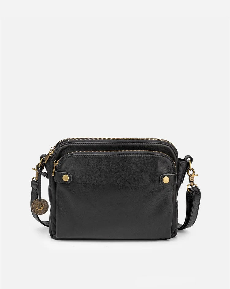 Bruine dames schoudertas met verstelbare riem. Elegante crossbody tas, ruim en trendy voor elke gelegenheid.