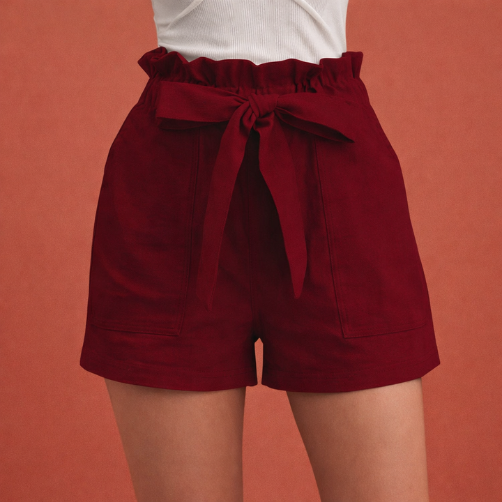 Dames shorts met hoge taille en strikceintuur. Comfortabele, modieuze kortebroek voor zomer, strand en vakantie.