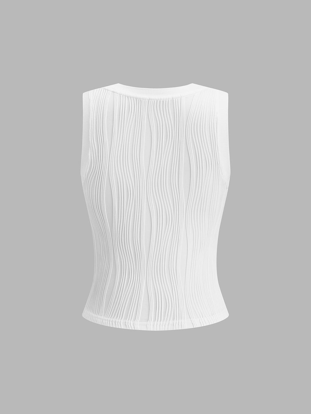 Modieuze dames zomertop. Mouwloze slim fit tank top met stijlvolle golvende textuur en ronde hals.