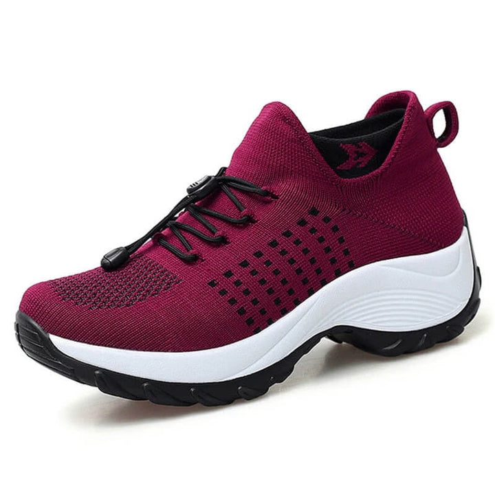 Stijlvolle dames sneakers met ademend sokontwerp. Perfect voor lichte sport, wandelen en dagelijks comfort.