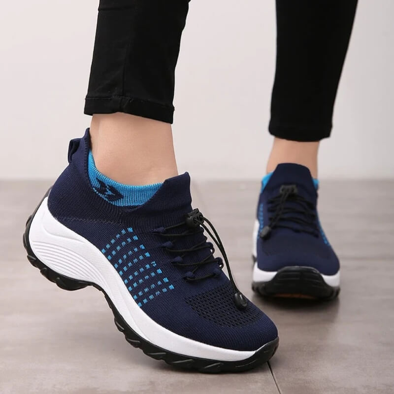 Dames sneakers met geavanceerde schokabsorptie en flexibele zool. Comfortabel sokontwerp voor dagelijks wandelen.