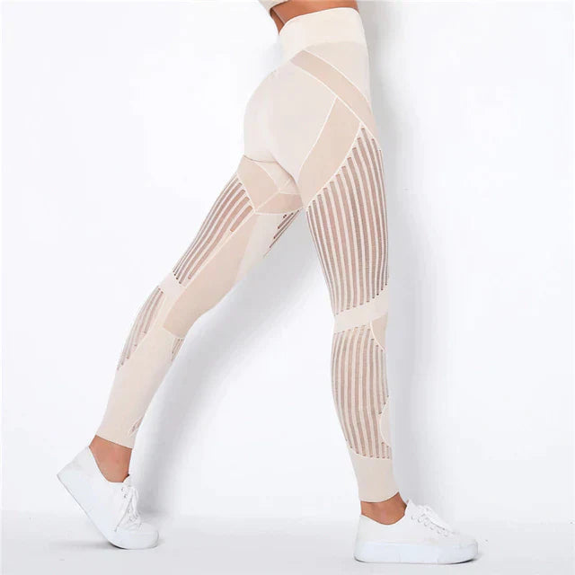 Dames sportlegging met hoge taille, compressie en shaping, ideaal voor fitness en yoga.