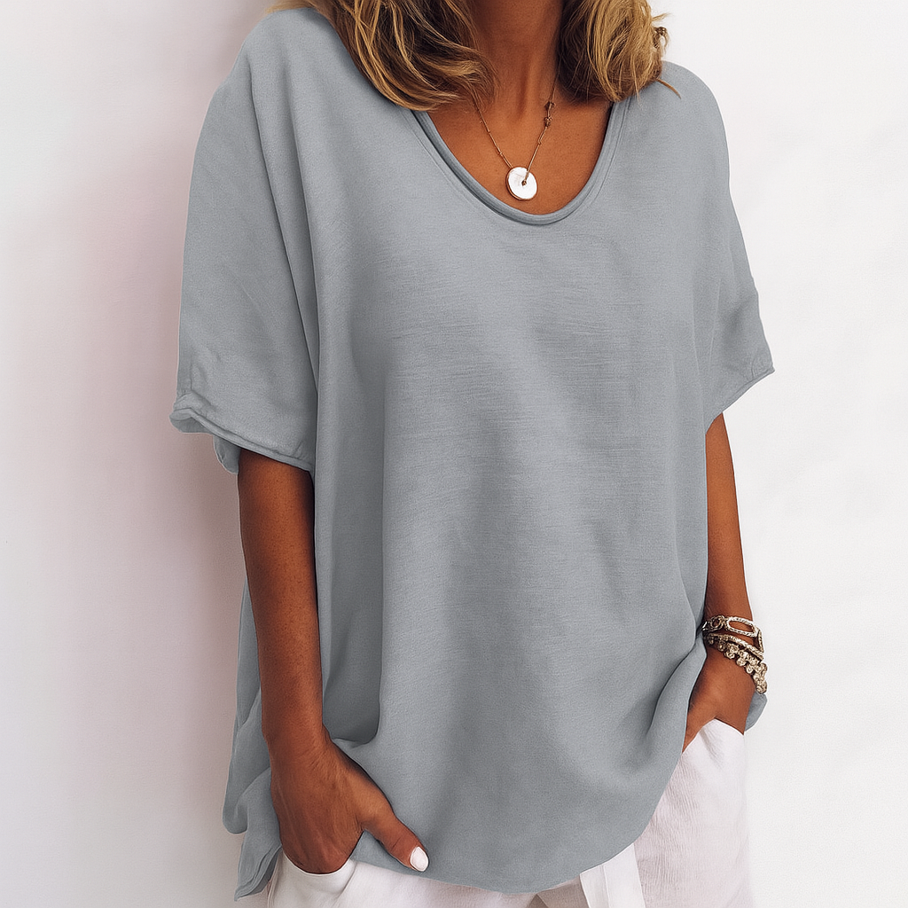 Losvallend dames t-shirt met ronde hals, comfortabel en casual. Perfecte basis voor elke stijlvolle outfit.