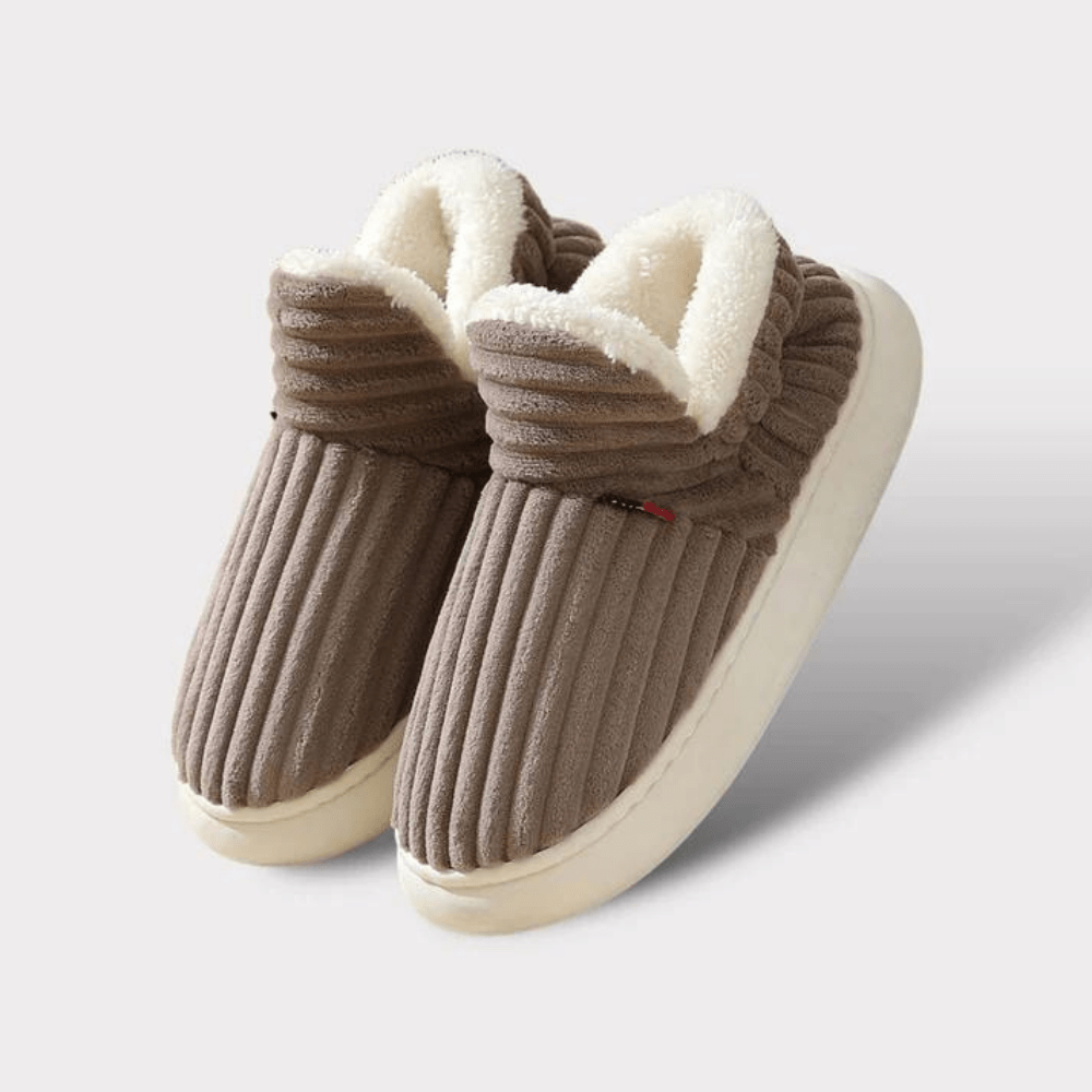 Warme en behaaglijke thermische damespantoffels, ontworpen voor maximaal comfort in huis.