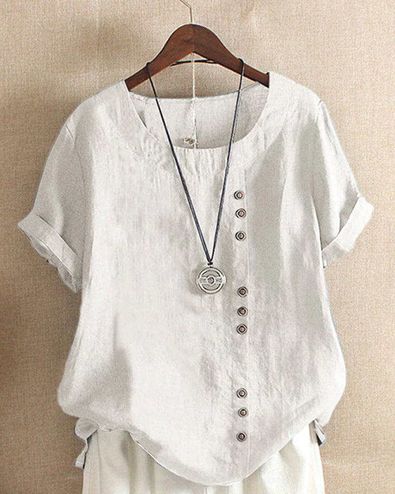 Comfortabele dames top met korte mouwen en stijlvolle knoopjes. Perfect voor lente mode en een trendy zomer look.