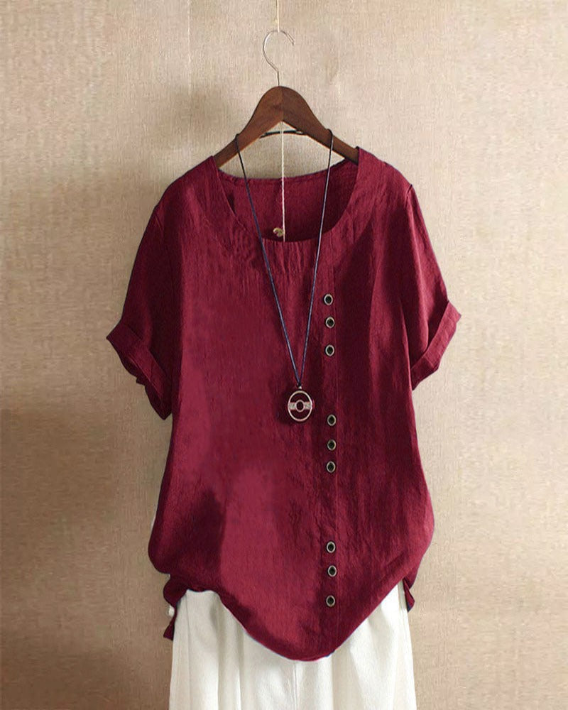 Casual chique dames top met korte mouwen en subtiele knoopdetails. Comfortabel en trendy voor lente en zomer.