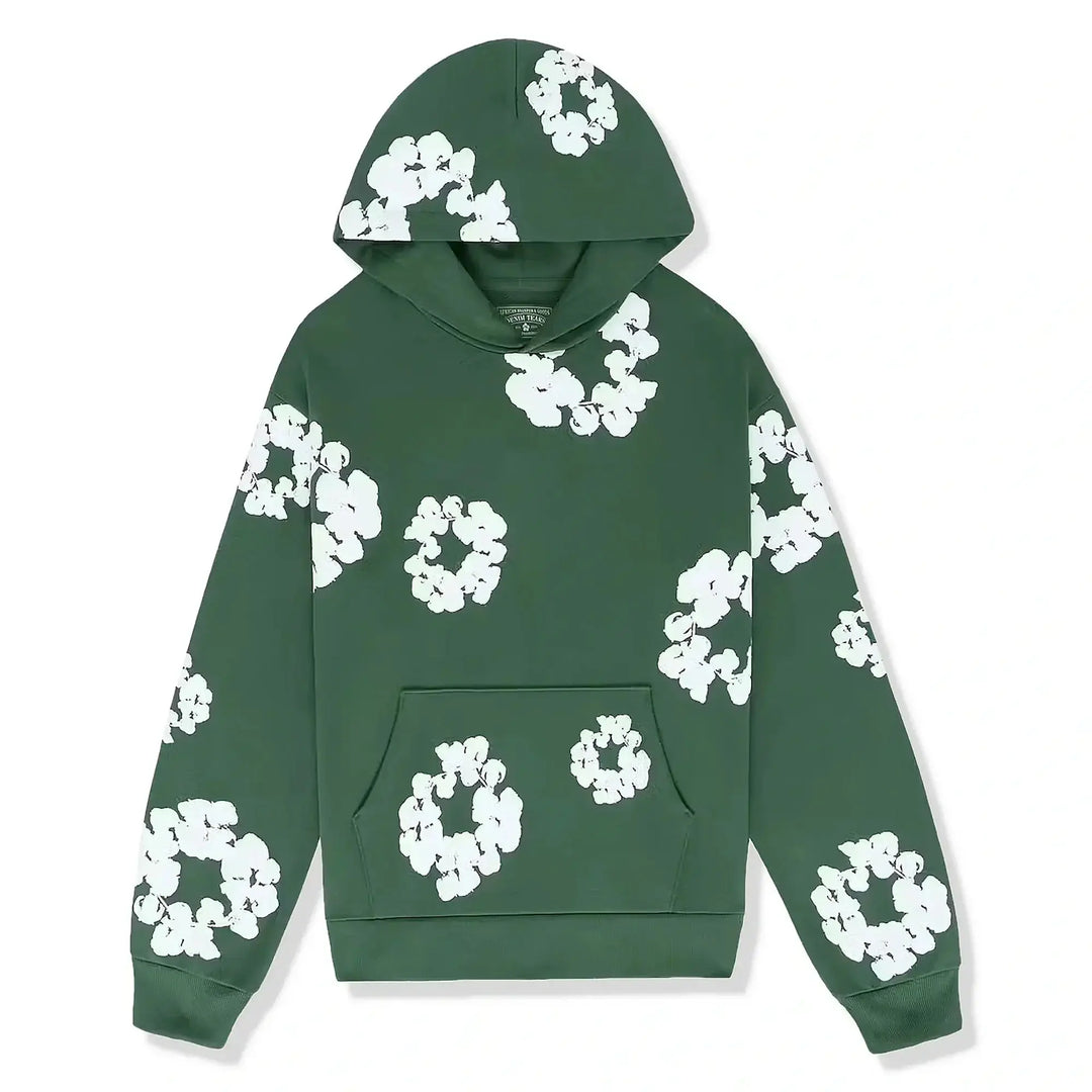 Close-up van de stijlvolle bloemdetails op de mouw van de Selvianne dames trainingsset hoodie.