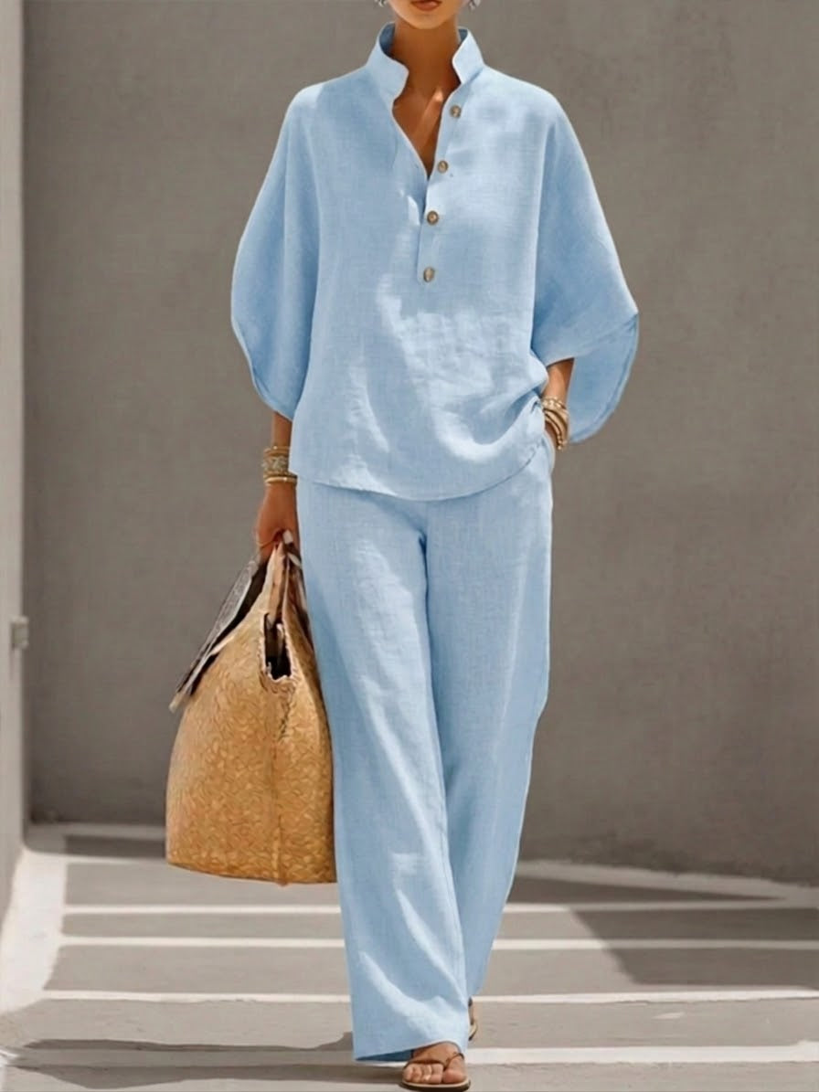 Elegante dames tweedelige set. Top met vleermuismouwen & minimalistische wijde broek. Perfect voor zomer.