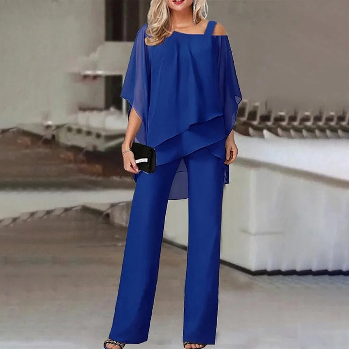 Elegante dames zomer set met stijlvolle top en soepele broek. Comfortabel voor modebewuste vrouwen.