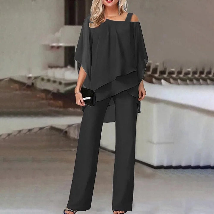 Stijlvolle dames tweedelige zomer set met elegante top & luchtige broek. Perfect voor een relaxte, chique look.