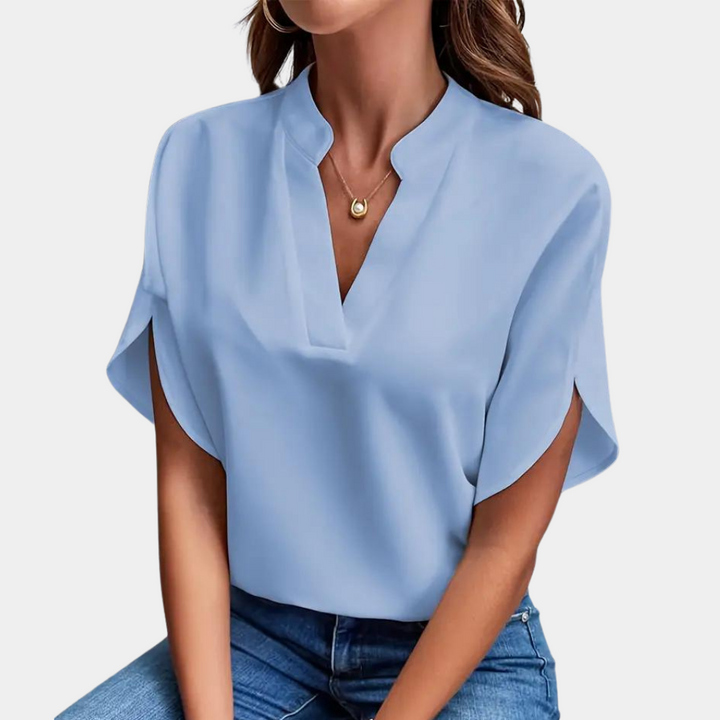 Dames V-hals blouse met korte mouwen, elegant en luchtig. Ideaal voor een modieuze zomerse look.