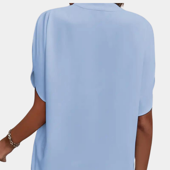 Casual elegante dames V-hals blouse met korte mouwen, ideaal voor diverse zomerse gelegenheden. Flatterend.