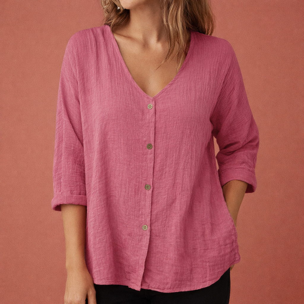Losvallend dames V-hals T-shirt met knoopsluiting, driekwart mouwen. Perfect voor casual lente/zomer look.