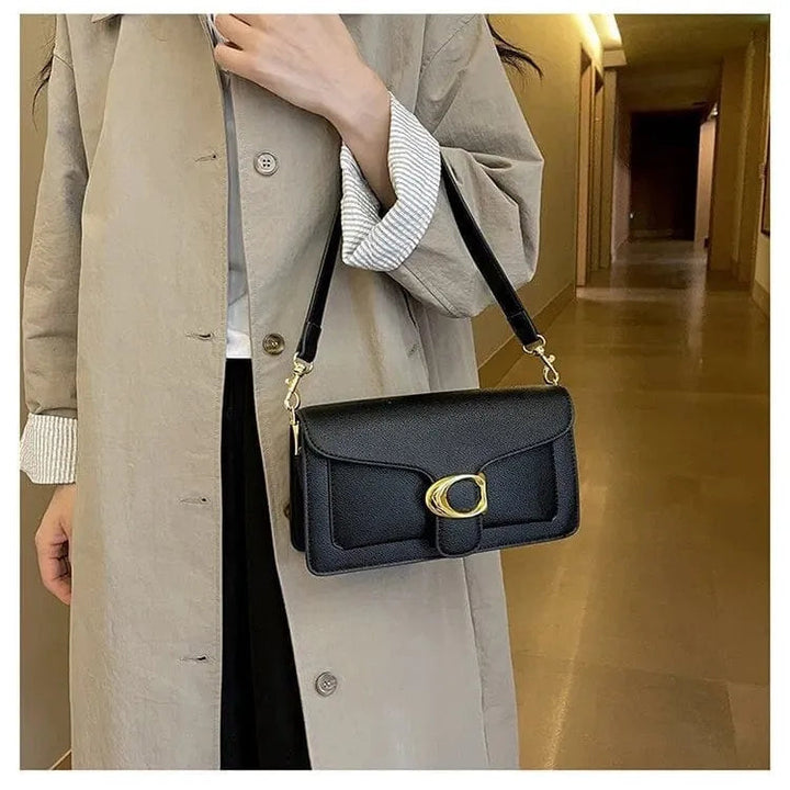 Elegante dames schoudertas van vegan leer, veelzijdig te dragen als handtas of crossbody.