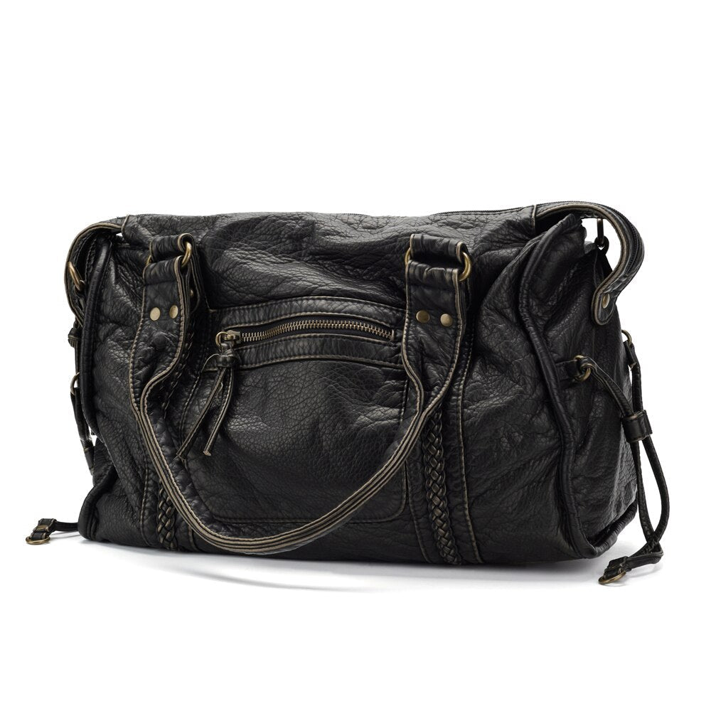 Elegante vintage dames handtas, ruime schoudertas voor een tijdloze look.