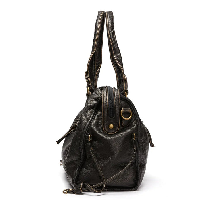 Chique vintage dames handtas, ruim en comfortabel, een must-have accessoire voor elke vrouw.
