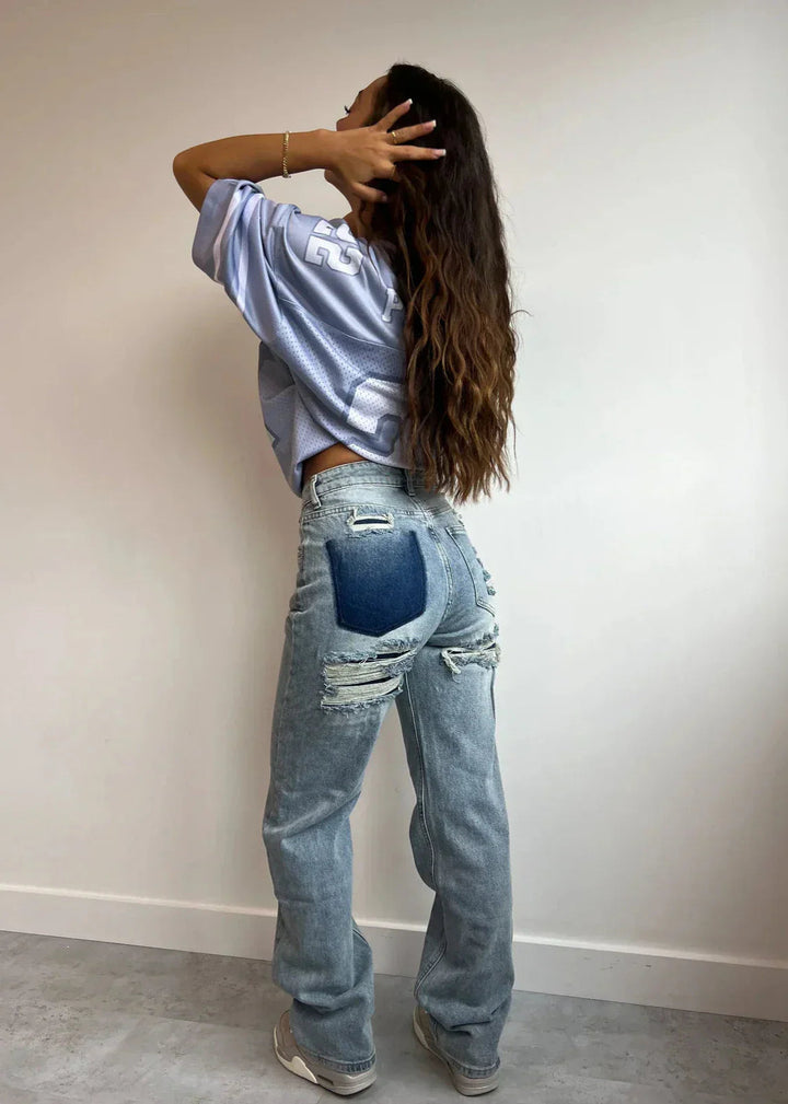 Dames vintage ripped jeans met relaxte pasvorm. Comfortabele straight fit voor casual streetstyle mode.