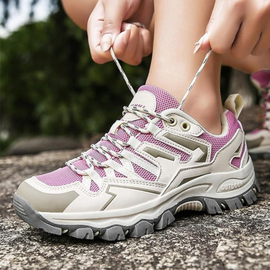 Dames wandelschoenen (paars grijs) met stevige grip en ondersteuning, ideaal voor lange comfortabele wandelingen.