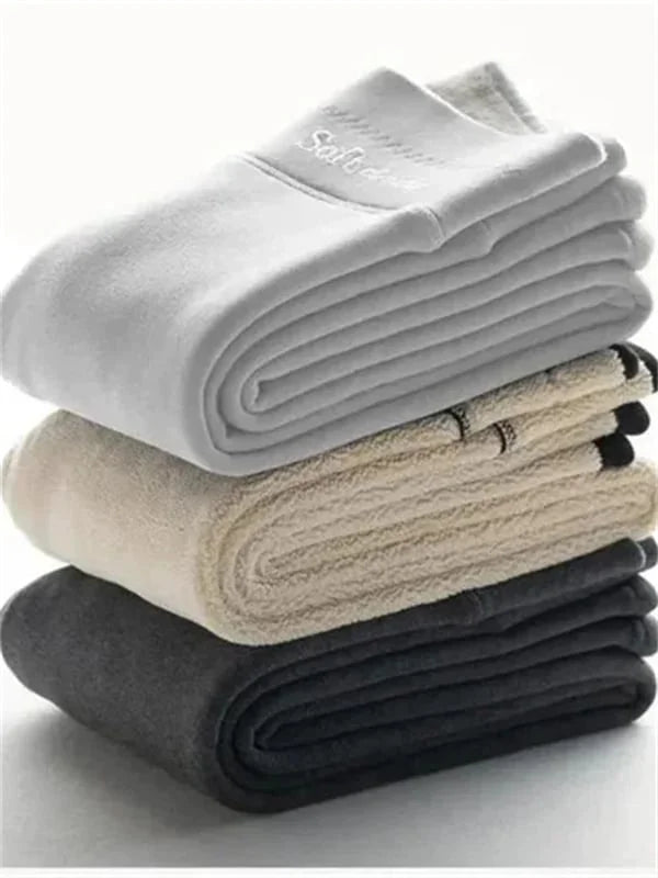 Grijze dames winter leggings. Comfortabele en warme stretch leggings, perfect voor koude dagen.
