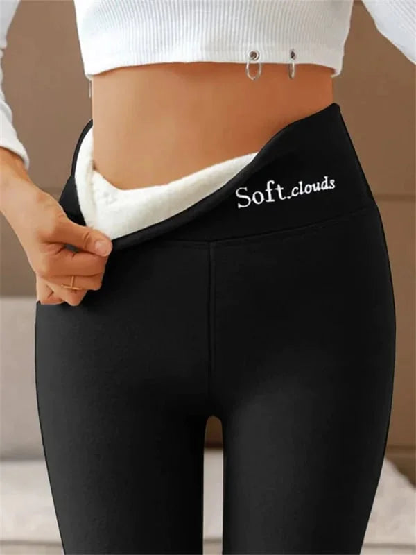 Donkergrijze dames warme leggings. Zachte comfortabele stretch winter leggings, ideaal voor koude dagen.
