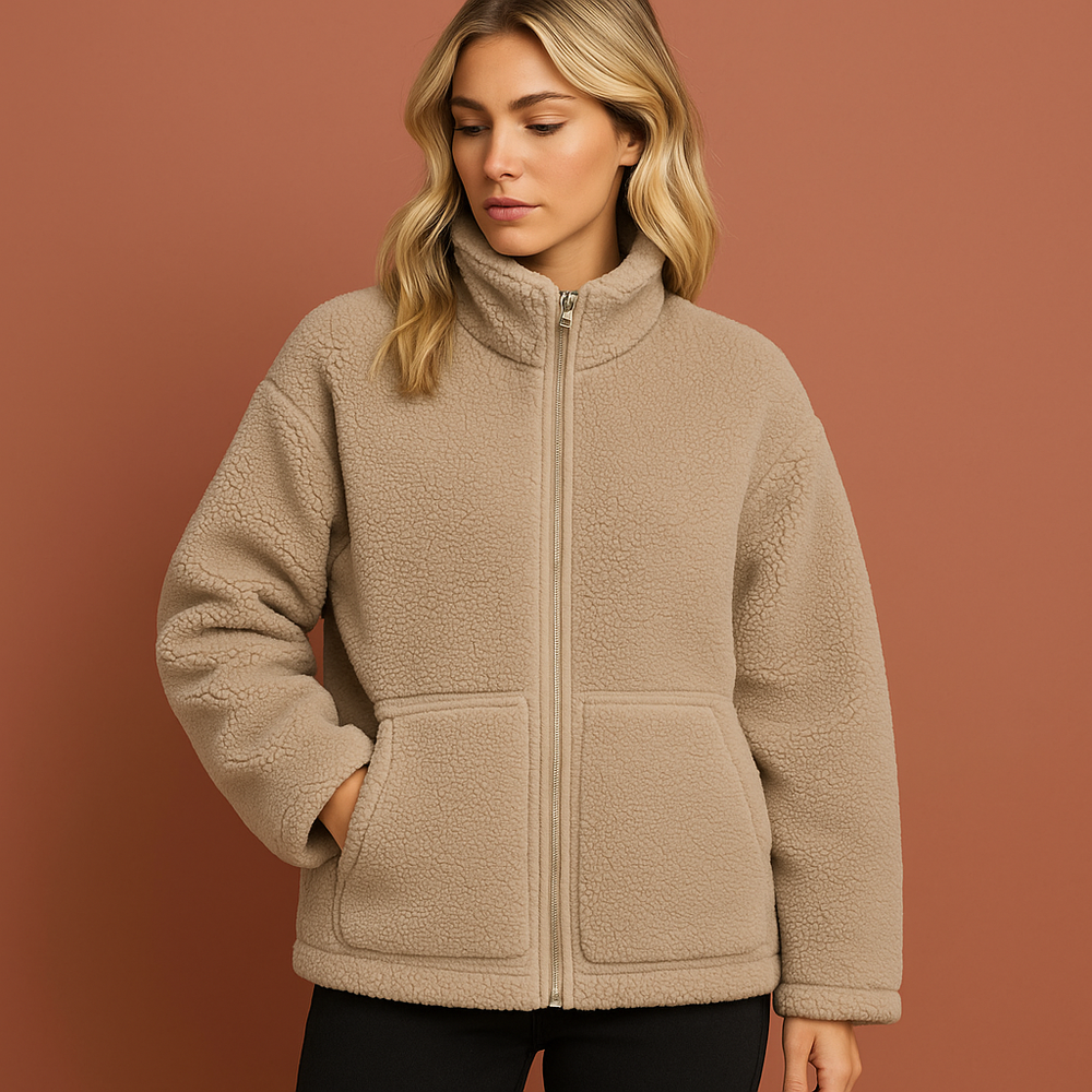 Zachte dames teddyjas, elegant en chic. Perfecte modekeuze voor een stijlvolle en comfortabele herfst/winterlook.