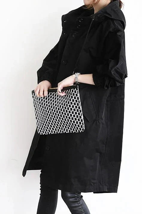 Trendy lange regenjas voor dames, met verstelbare capuchon en waterafstotende stof.