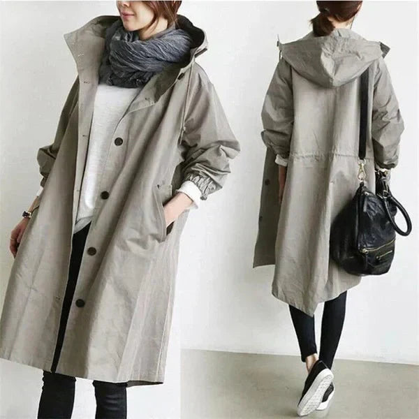 Stijlvolle lange dames regenjas; comfortabel en weerbestendig. Perfect voor dagelijks gebruik.