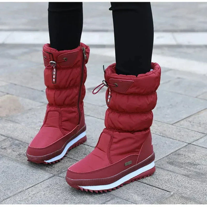 Moderne dames winterlaarzen: waterdichte snowboots, warm, met stevige antislipzool voor comfort en stijl in de sneeuw.