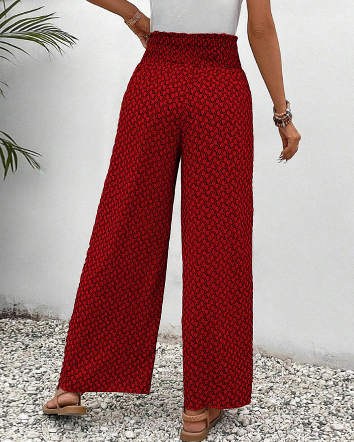 Trendy dameskleding: wijde broek met uniek geometrisch patroon, perfect voor elke gelegenheid.