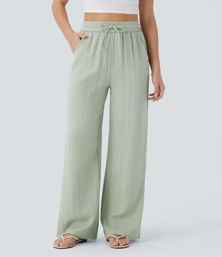 Modieuze wijde dames zomerbroek Brisa; luchtig design met trekkoord en elastiek, perfect voor vakantie of strand.