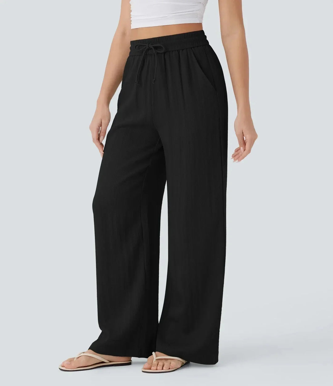 Ademende Brisa dames zomerbroek met wijde pijpen, elastische taille en trekkoord; comfortabel en luchtig voor de zomer.