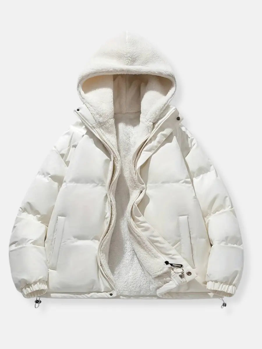 Close-up van de stof van de Lunara dames winterjas, met gewatteerd detail en kwaliteit.