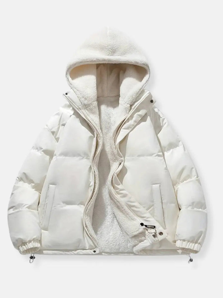 Close-up van de stof van de Lunara dames winterjas, met gewatteerd detail en kwaliteit.