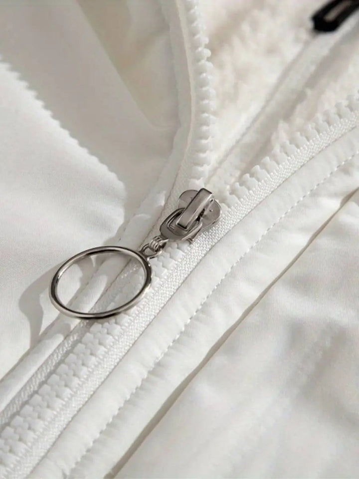 Beige Lunara dames winterjas, veelzijdige gewatteerde jas met een tijdloos design.