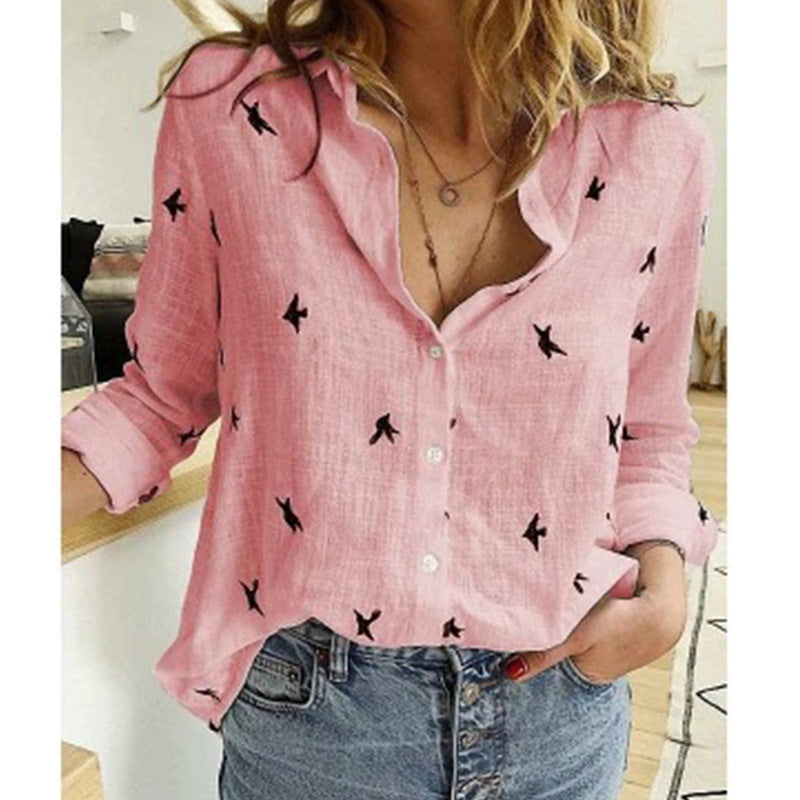 Stijlvolle damesblouse met bloemenprint, halflange mouwen en een modieuze lage hals.