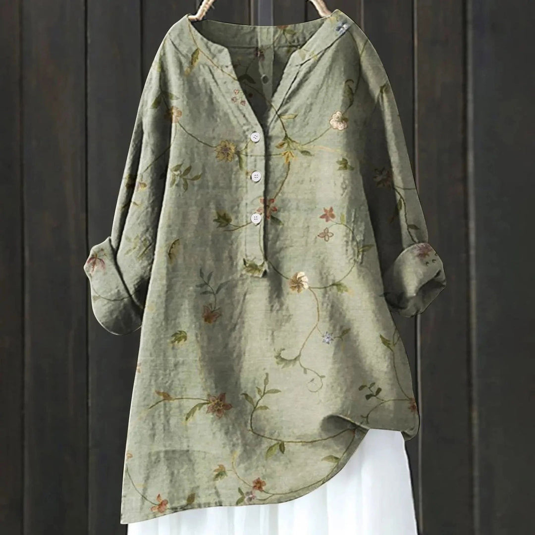 Casual-chic damesblouse met bloemenprint, V-hals en lange mouwen. Een essentieel luchtig kledingstuk voor de zomer.