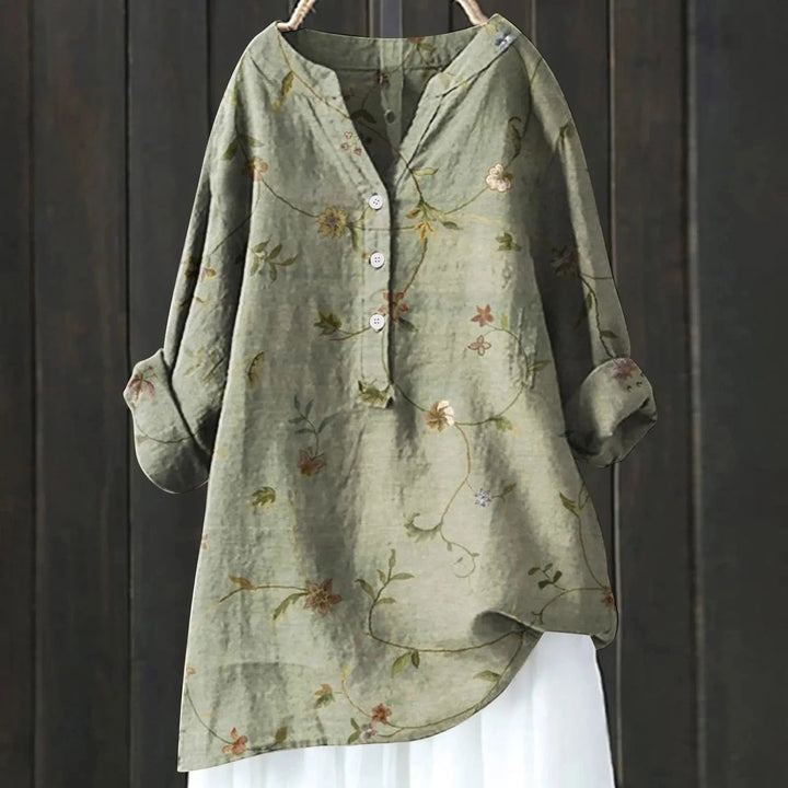 Casual-chic damesblouse met bloemenprint, V-hals en lange mouwen. Een essentieel luchtig kledingstuk voor de zomer.