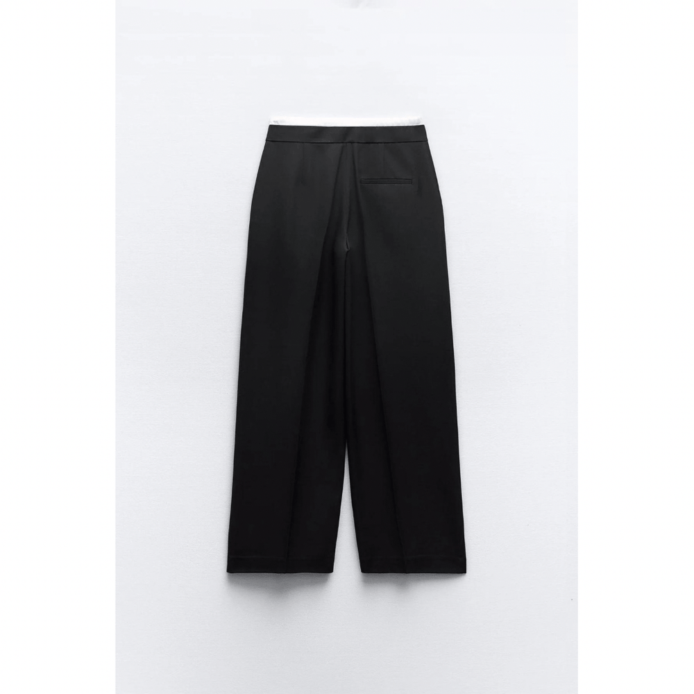 Elegante damesbroek met dubbele tailleband, perfect voor zakelijke of casual outfits. Veelzijdig en stijlvol.
