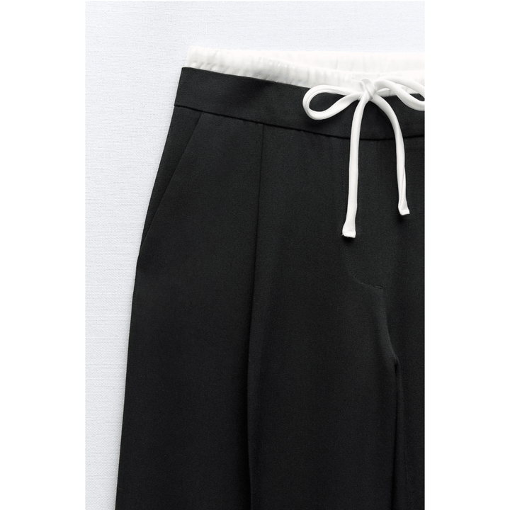 Comfortabele damesbroek met dubbele tailleband en regular fit, ideaal voor dagelijks gebruik. Zacht en modieus.