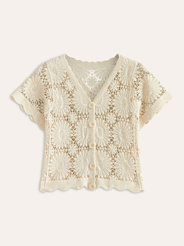 Damesvest met kleurrijk bloemenpatroon en knoopsluiting. Comfortabel gebreid vest, ideaal voor lente en herfst.