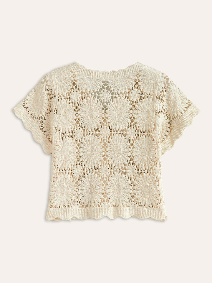 Stijlvol gebreid damesvest met bloemenprint en knopen. Comfortabel voor het tussenseizoen; een trendy toevoeging.